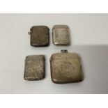 Victorian silver vesta case with engraved decoration, (Birmingham 1900), together with three other s