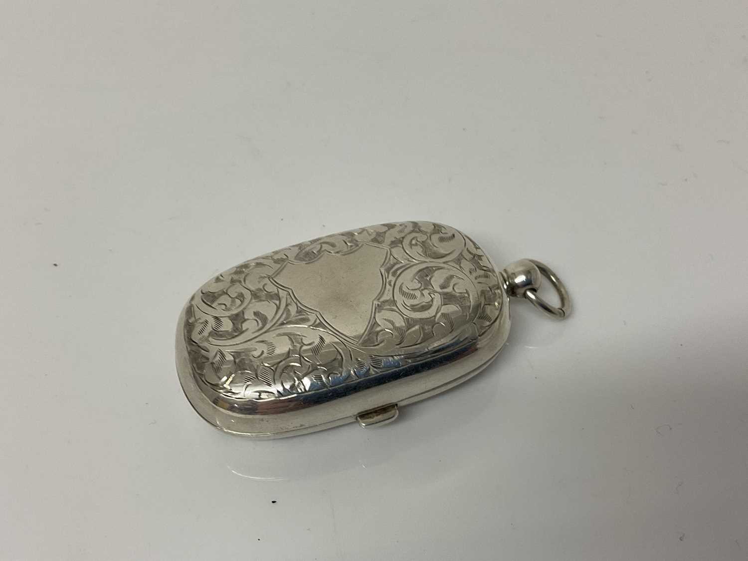 Edwardian silver double sovereign case with engraved foliate decoration, (Birmingham 1908), maker Wi