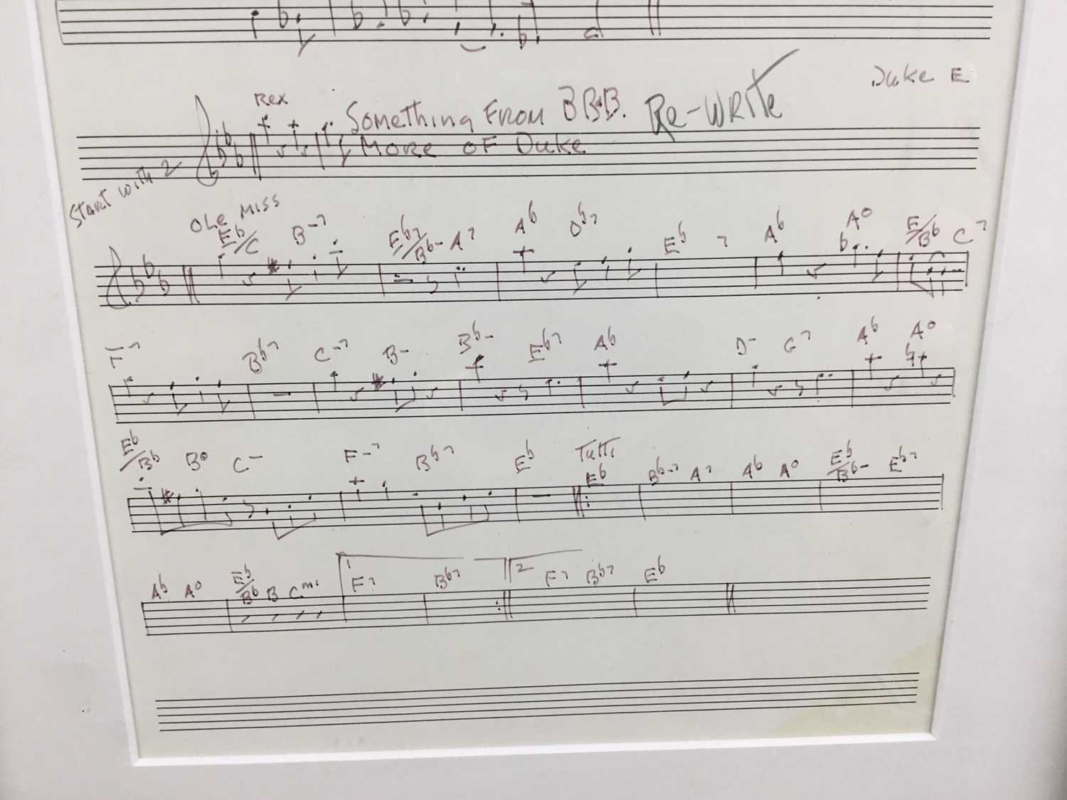 A framed music score, hand-written, probably from Ronnie Scott's in 1965, with parts for Jimmy Rowle - Image 7 of 7
