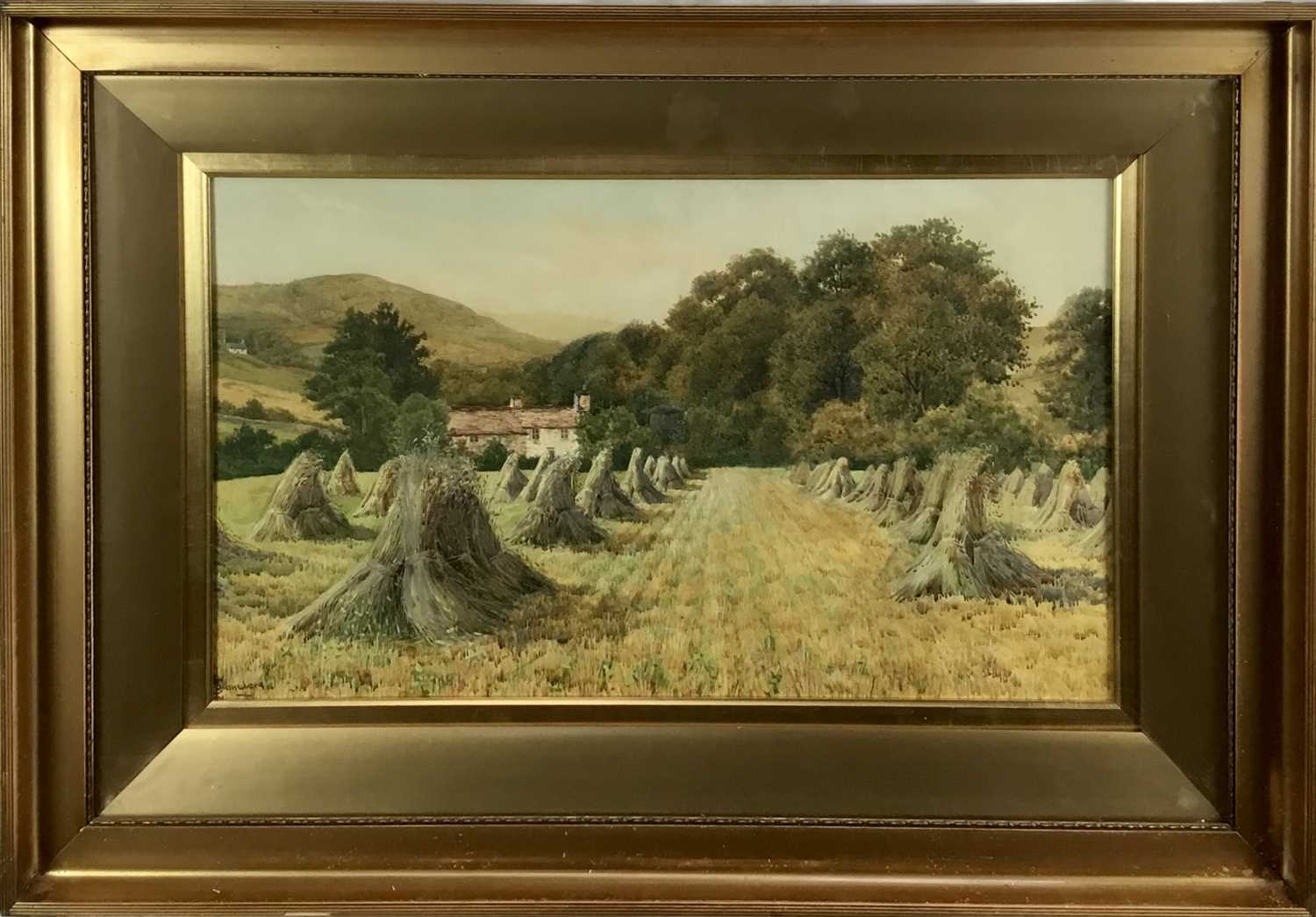Charles L. Saunders (?-1915) watercolour - The Hay Stooks, signed, 44cm x 75cm, in glazed gilt frame