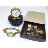 Longines gold plated stainless steel wristwatch, Mont Blanc travel clock in leather case, gold plate
