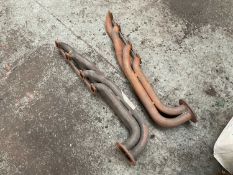 Pair of TVR exhaust manifolds believed to come from a Pre Cat Griffith.