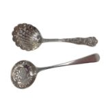 A rare Bacchanalian pattern silver sifter ladle with fluted bowl, the handle showing Bacchus riding