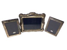 Pair of silver photograph frames and one other Mappin & Webb silver photograph frame with engraved p