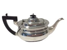 Silver teapot with ebonised handle and knop