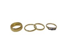 Three 22ct gold wedding rings and an 18ct gold sapphire and diamond ring with missing stone (4)