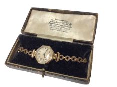 Vintage 9ct gold cased wristwatch on a gold plated bracelet