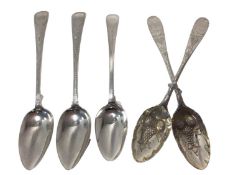 Group of Georgian silver spoons, including a pair of silver and gilt later-decorated berry spoons, E