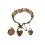 9ct gold gate bracelet with padlock clasp, 9ct gold St. Christopher and a 9ct gold heart shaped lock