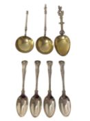 Two heavy Victorian silver gilt Renaissance-style spoons, London 1876, together with a continental s