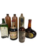 Seven bottles, including Gordon's gin, 1950s-60s, Drambuie, Apricot Brandy and three bottles of Dutc