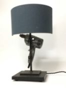 An old electric drill converted to a table lamp, perfect to put on the bedside table to ensure pleas