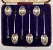 Set of six George VI silver coffee bean spoons in fitted case (Chester 1936). All at 1.1ozs