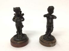 After Clodion, two 19th century bronze studies of classical fawns, signed on rouge marble bases, app