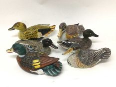 Group of six hand painted carved wooden ducks