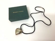 Contemporary silver heart shaped pendant with hammered finish, from Elizabeth Cannon, boxed