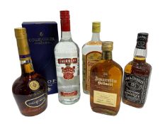 Five bottles, Gordon's Gin, Courvoisier VSOP Cognac, Jack Daniel's, Smirnoff vodka and Amaretto Bell