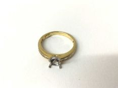 Diamond ring mount with baguette cut diamonds to the shoulders on 18ct gold shank