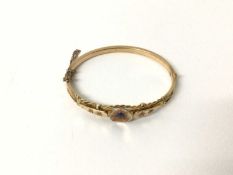 Late Victorian 15ct gold sapphire and diamond hinged bangle