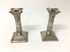 Pair of late Victorian silver Corinthian column candlesticks, London 1900, William Hutton & Sons