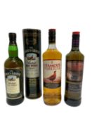 Three bottles, The Famous Grouse 1992, 40%, 70cl., in card tube, The Famous Grouse Smoky Black, 40%,