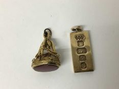 9ct gold ingot pendant with Queen Elizabeth II golden jubilee hallmarks for 1977, together with a 9c