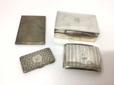 Four silver cigarette cases and a silver cigarette box