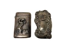Ornate late 19th century American Sterling silver Vesta case with embossed rococo decoration 68 x 4
