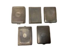 Five silver match book cases with engine turned decoration (5)