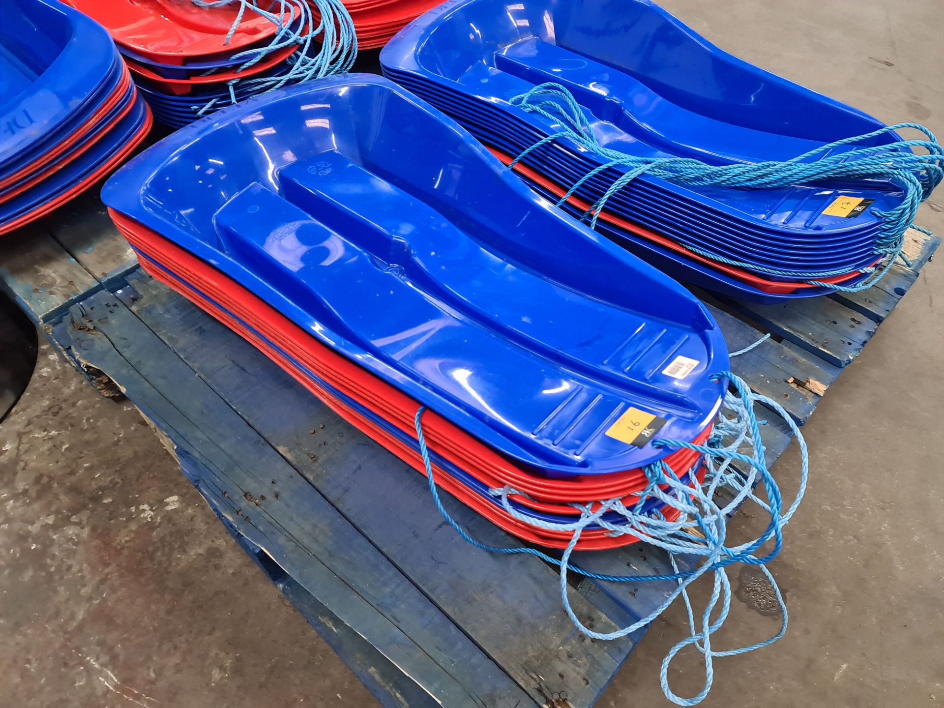 10 off Delta sledges - mixed lot of blue and red. NB - damage has been spotted to one sledge