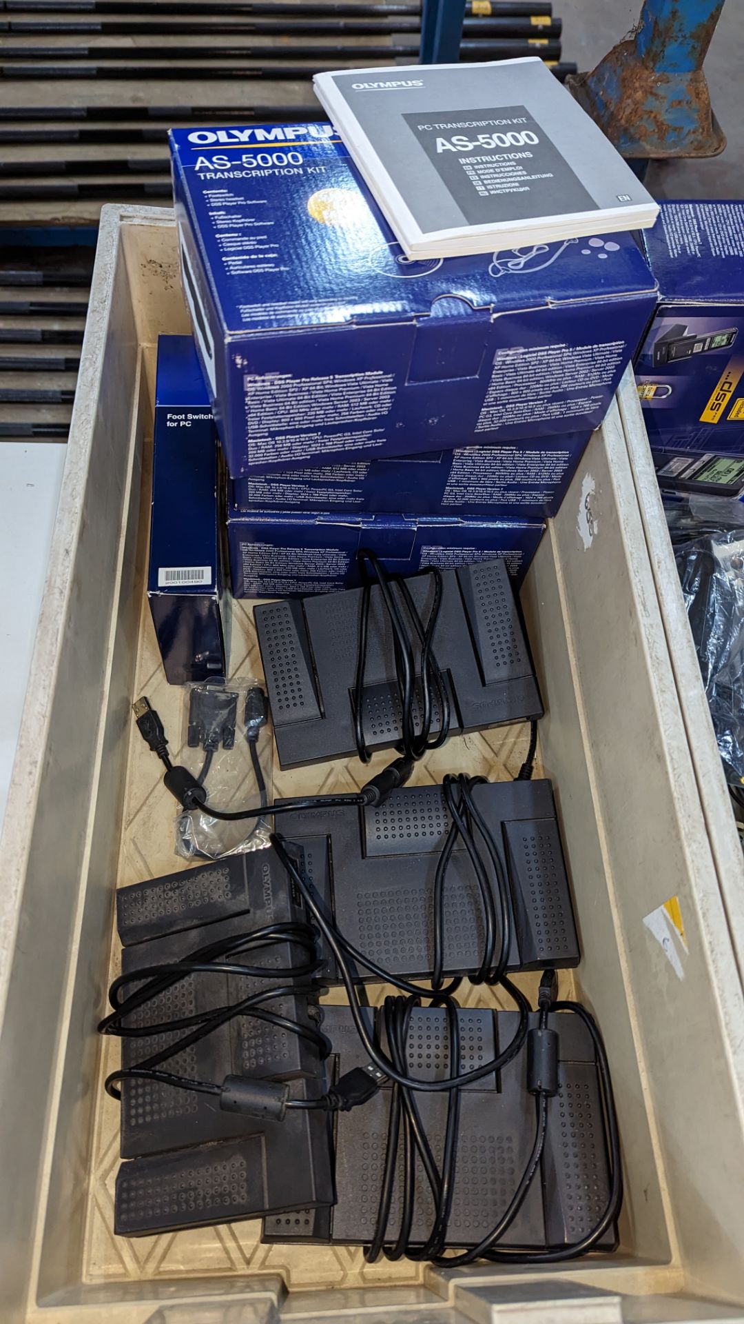 Olympus Pro dictation equipment - this lot includes four foot pedals plus a quantity of boxes, cable