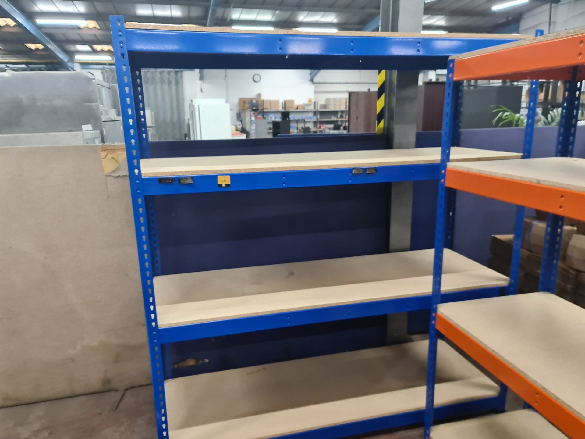 3 off blue metal shelving units. The shelves are stamped LA72 Rapid Racking. Each free standing bay