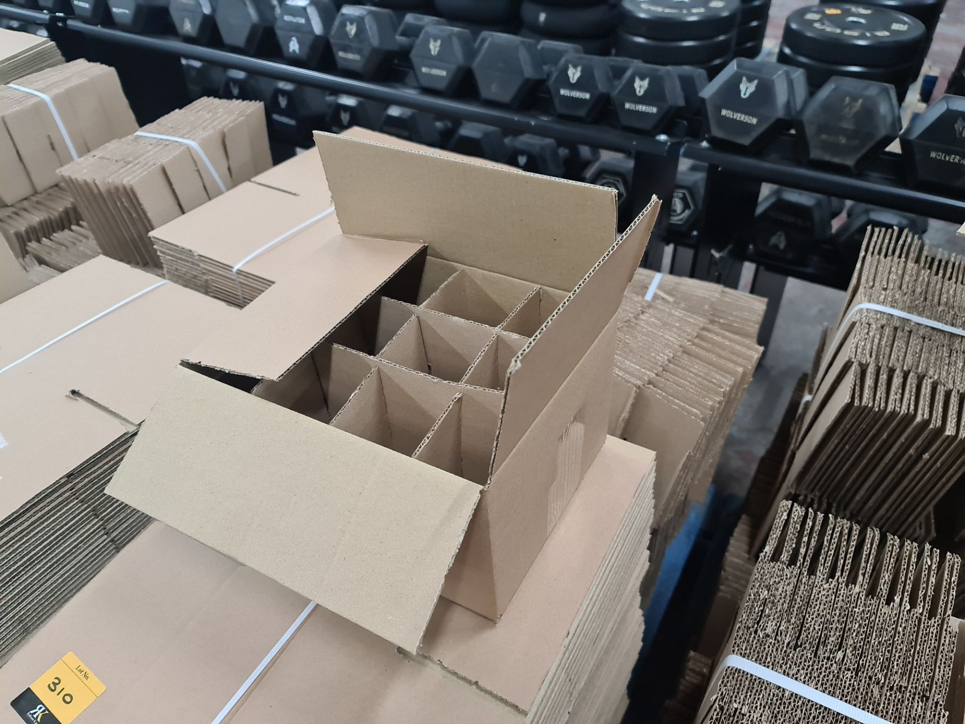 The contents of a pallet of cardboard boxes comprising approximately 300 boxes and 300 inserts in to