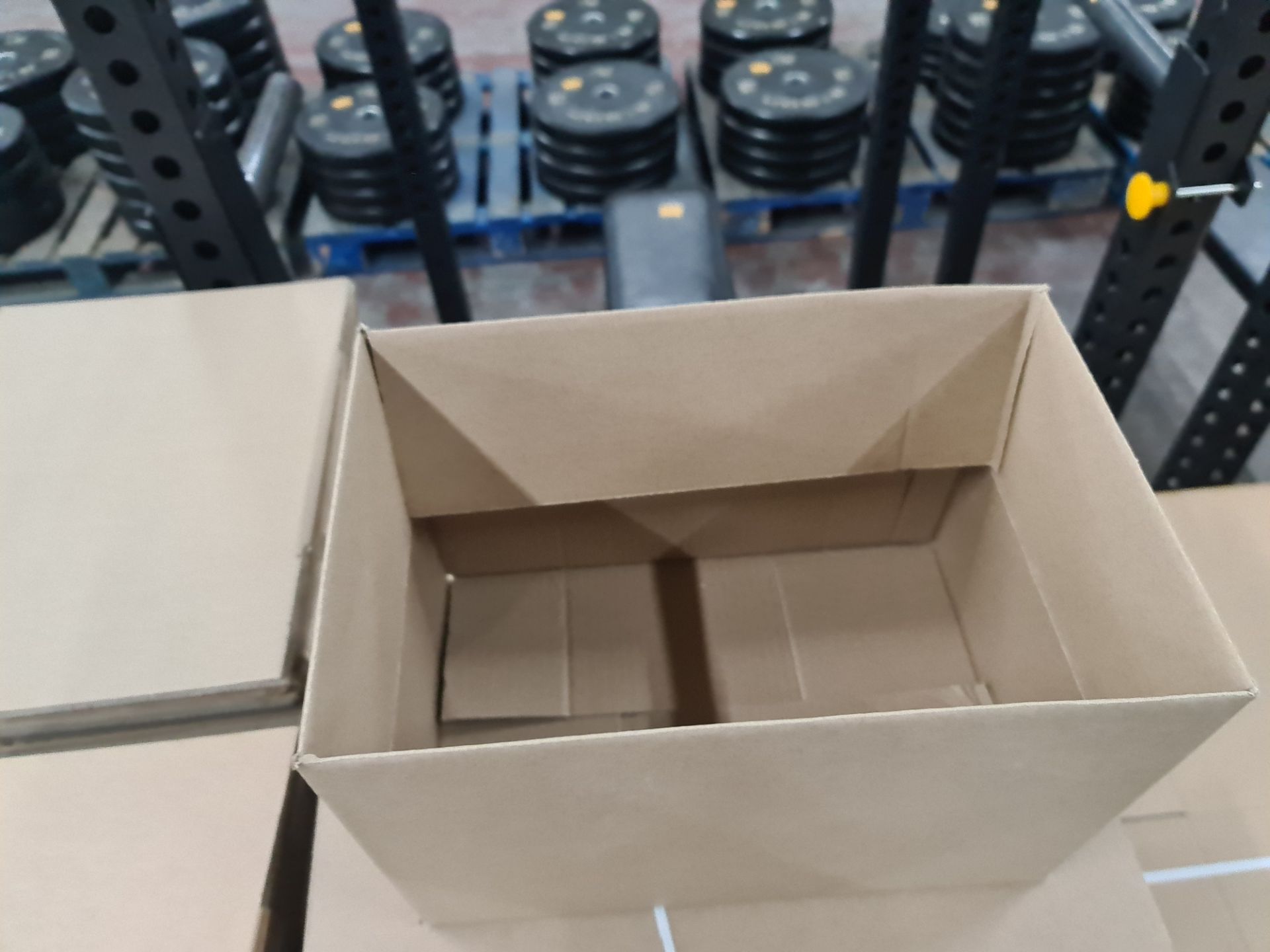 Approximately 180 cardboard boxes; 350 mm x 227 mm x 240 mm