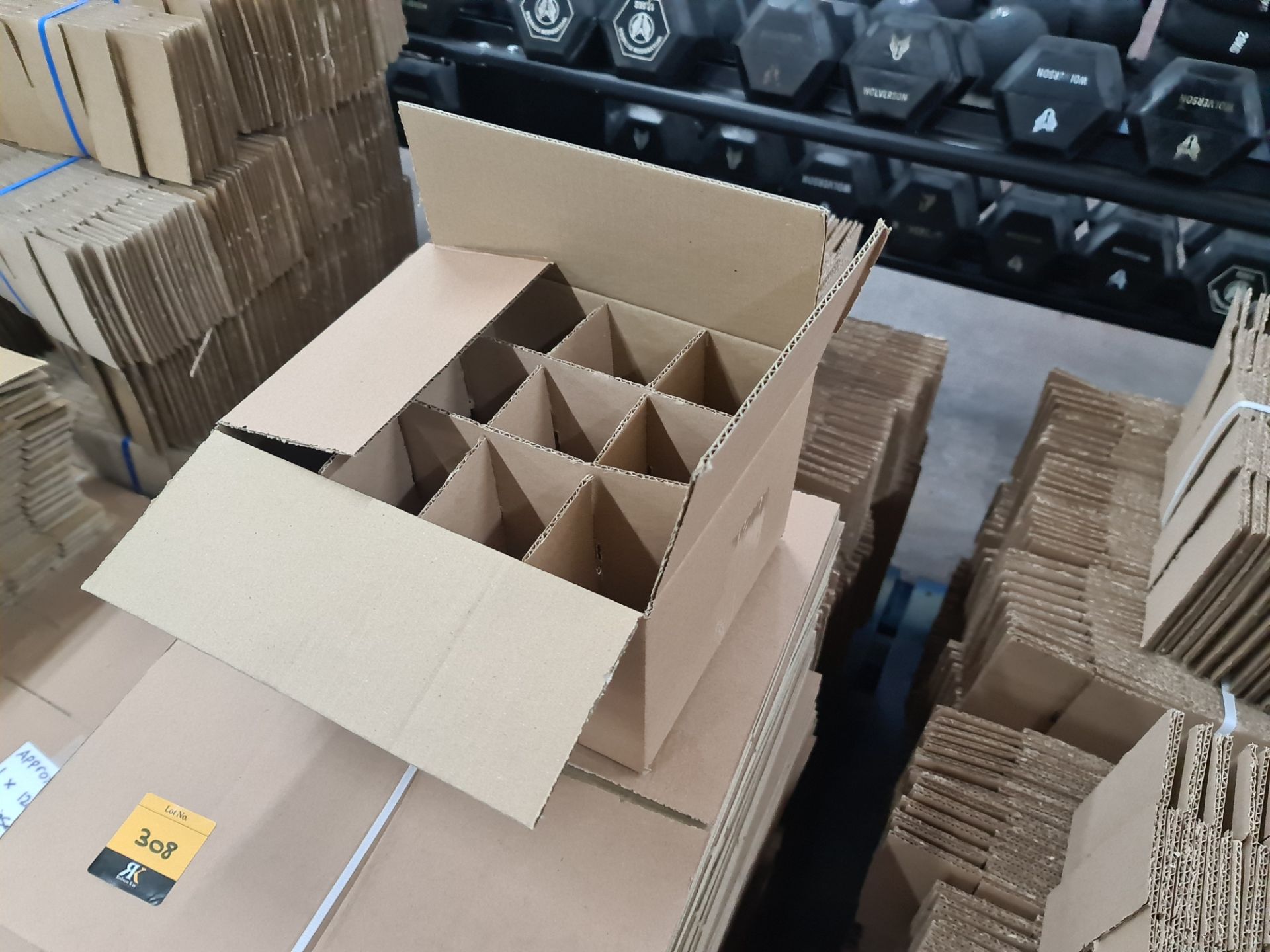 The contents of a pallet of cardboard boxes comprising approximately 300 boxes and 300 inserts in to