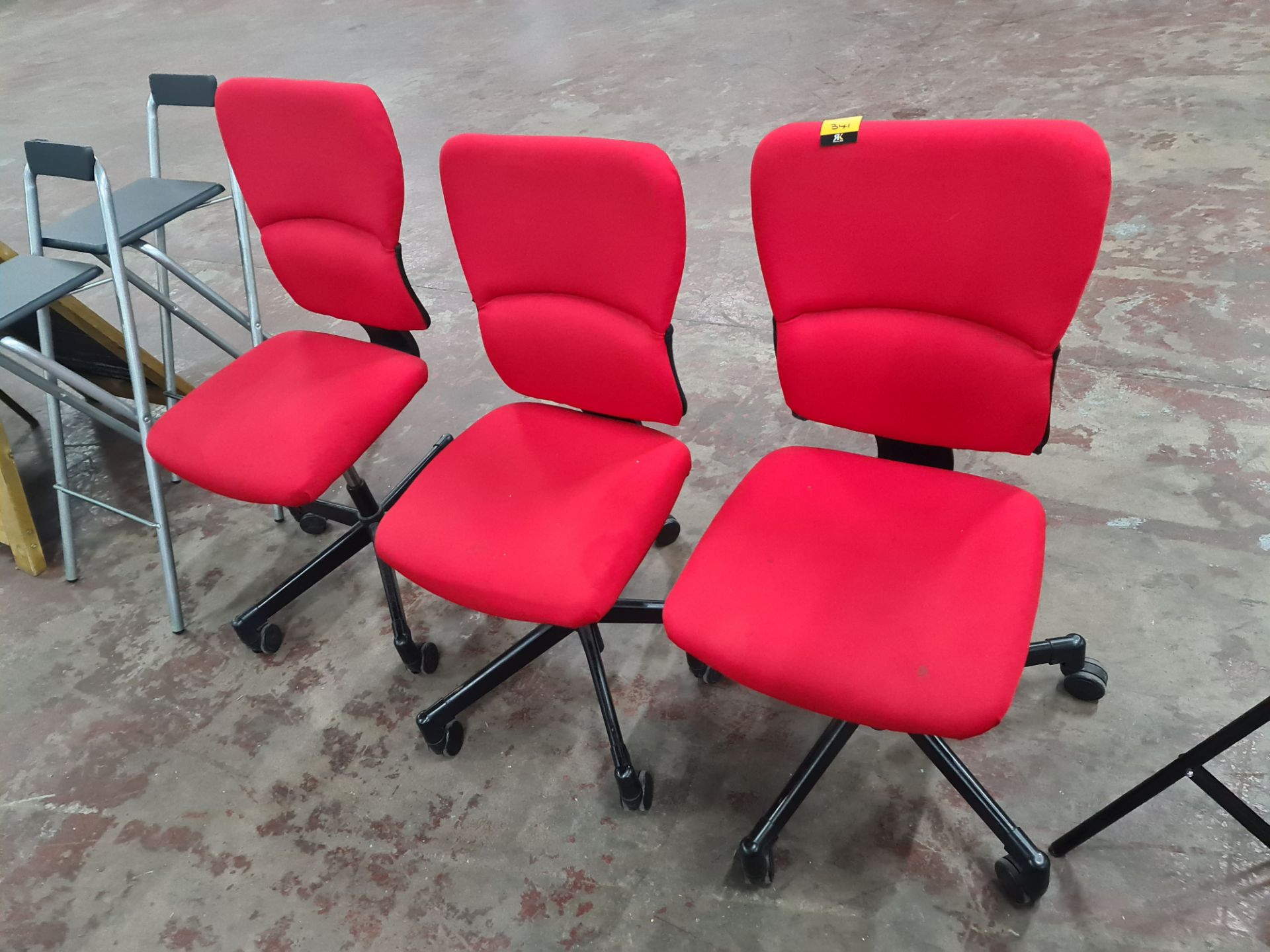 3 off matching red fabric operators chairs