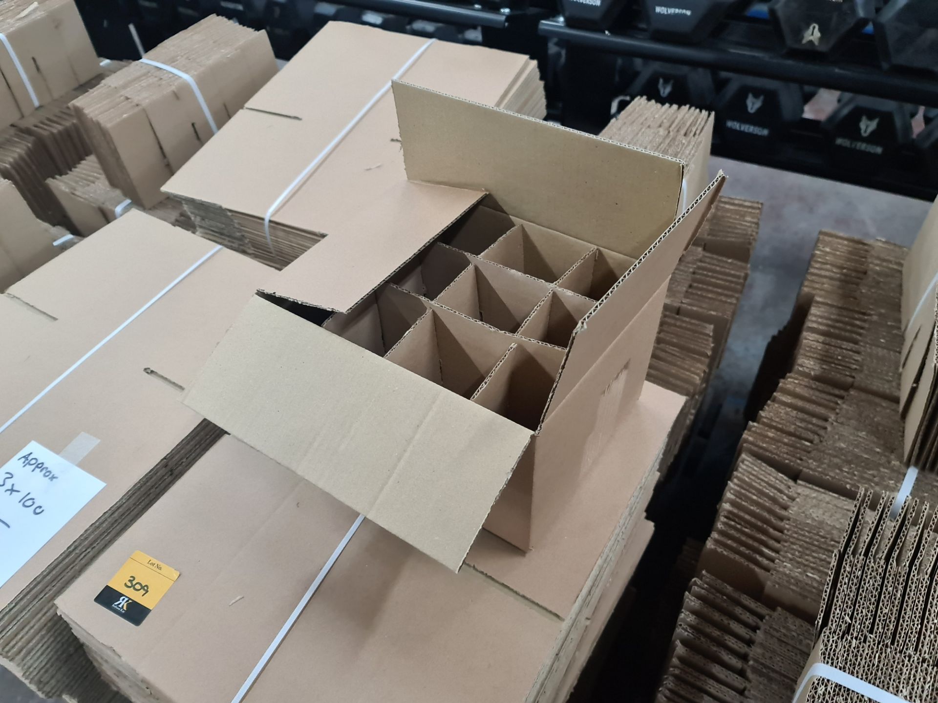 The contents of a pallet of cardboard boxes comprising approximately 300 boxes and 300 inserts in to