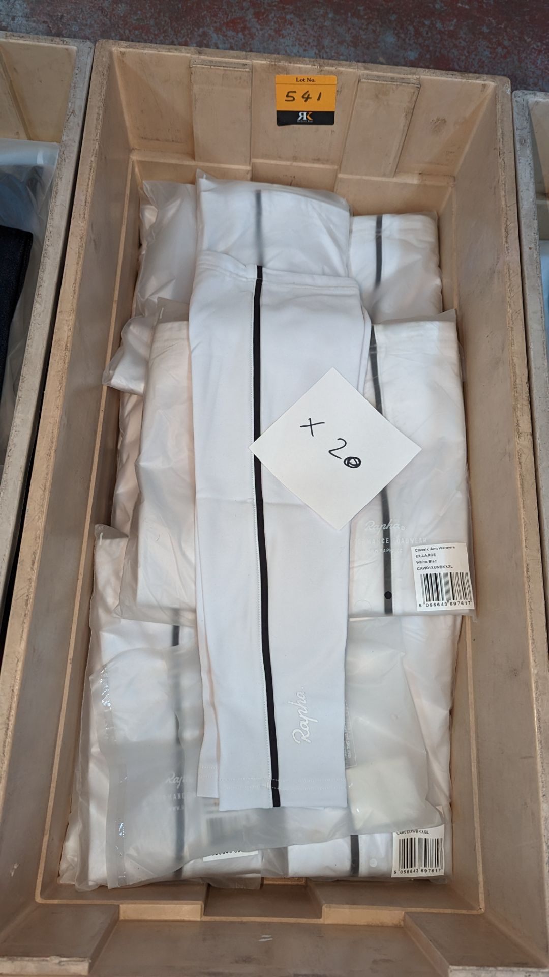 20 pairs of Rapha Cycling ladies arm warmers, in white with black detailing. These mostly appear to