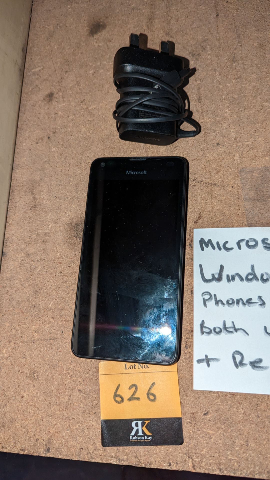 Microsoft Windows mobile phone including charger with cable