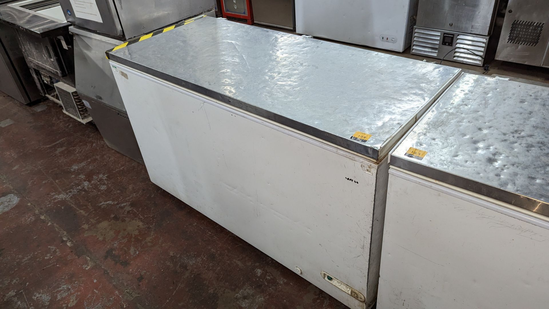 Chest freezer with stainless steel topped lid, approximately 150cm long