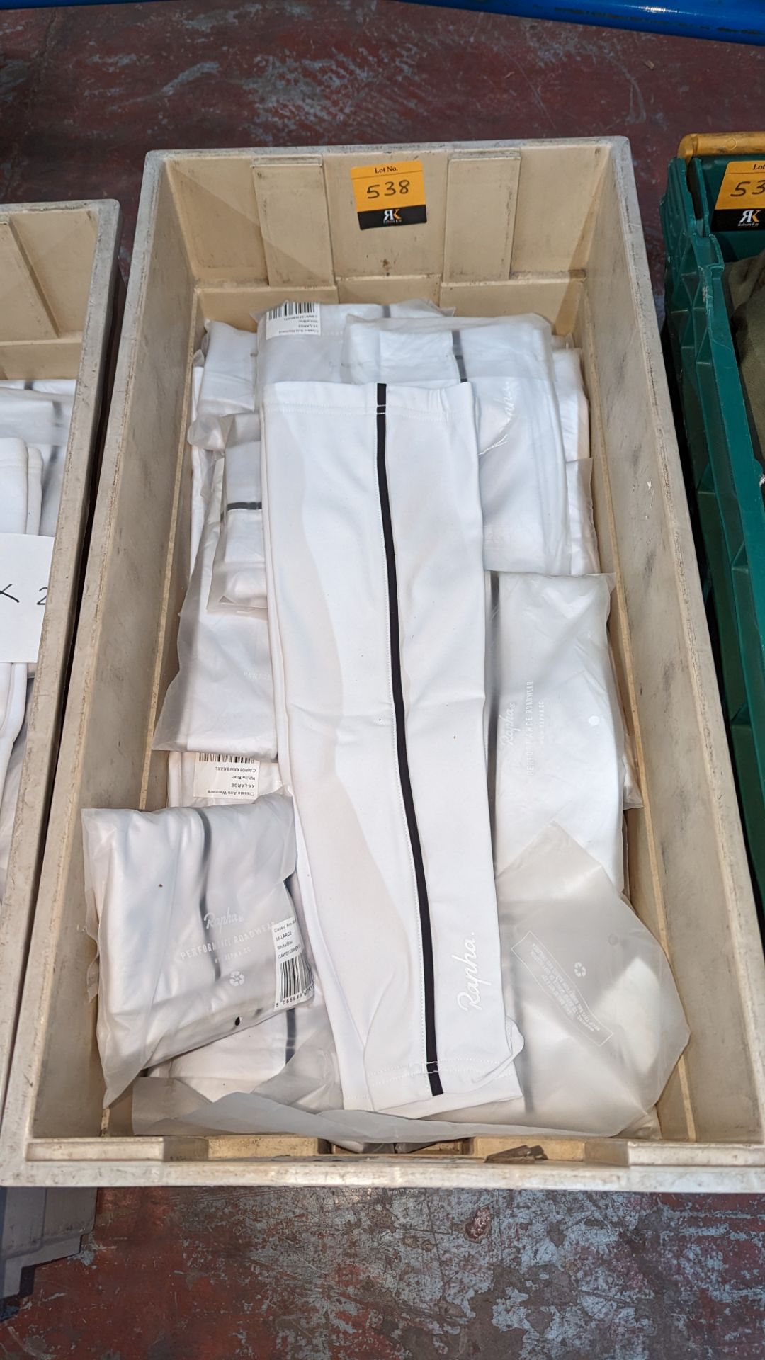 24 pairs of Rapha Cycling ladies arm warmers, in white with black detailing. These mostly appear to