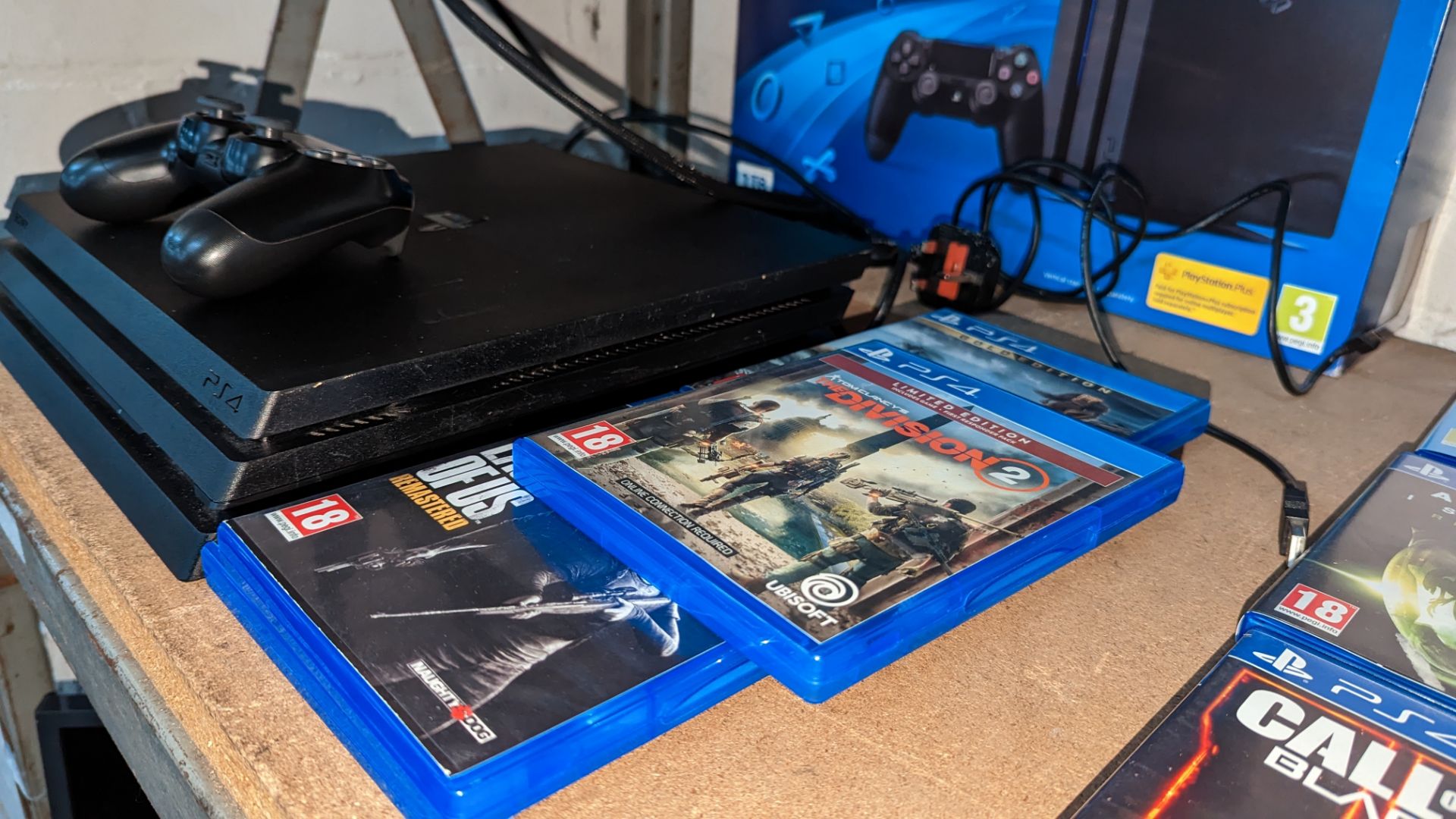 Sony PlayStation 4 Pro with controller, charging cable, original box & 5 off games as pictured - Image 5 of 14