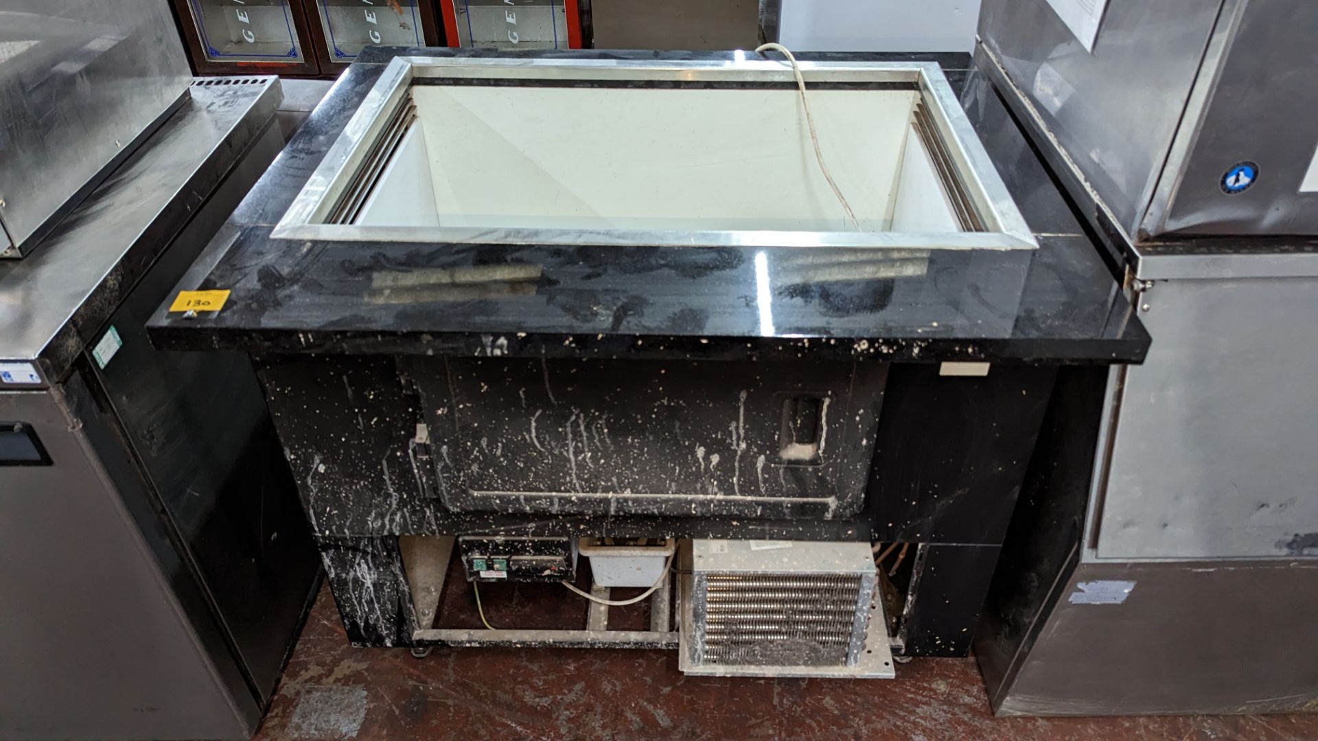 Refrigerated open top unit with marble/granite surround to top