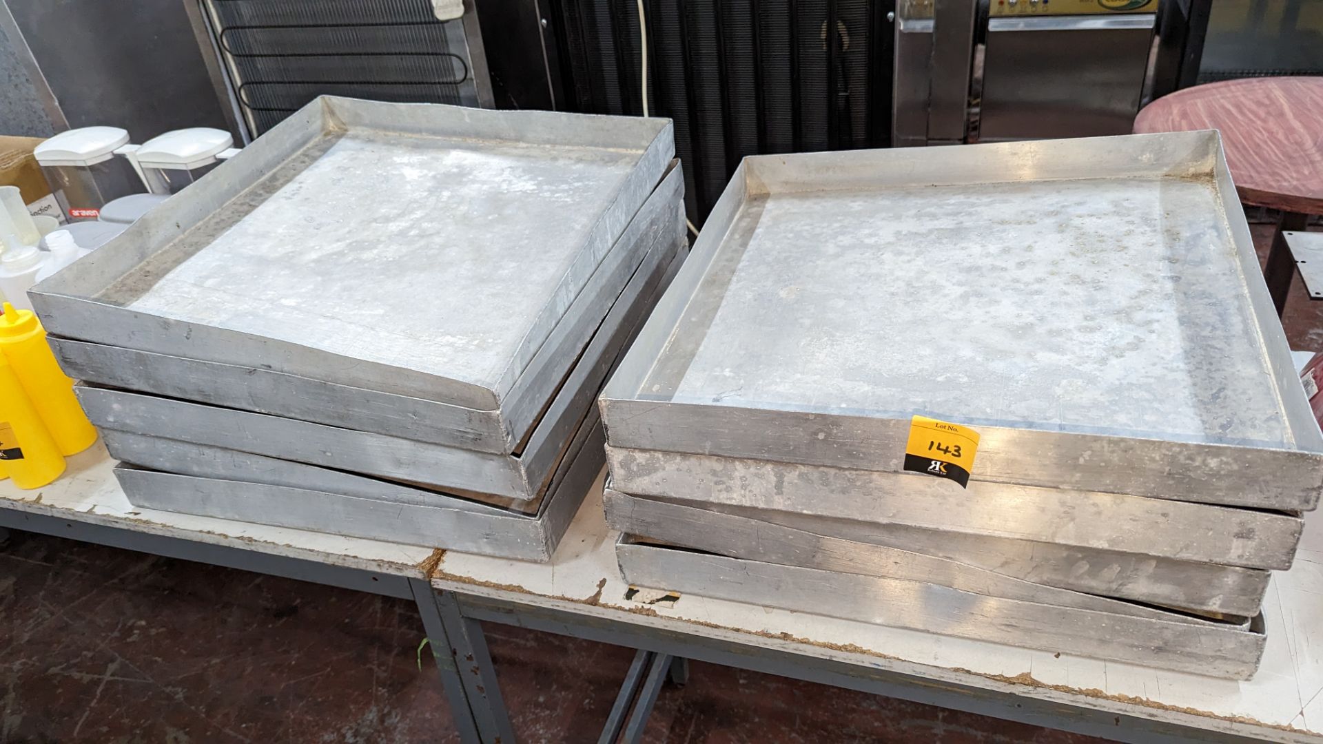 10 metal square trays each measuring 50cm square