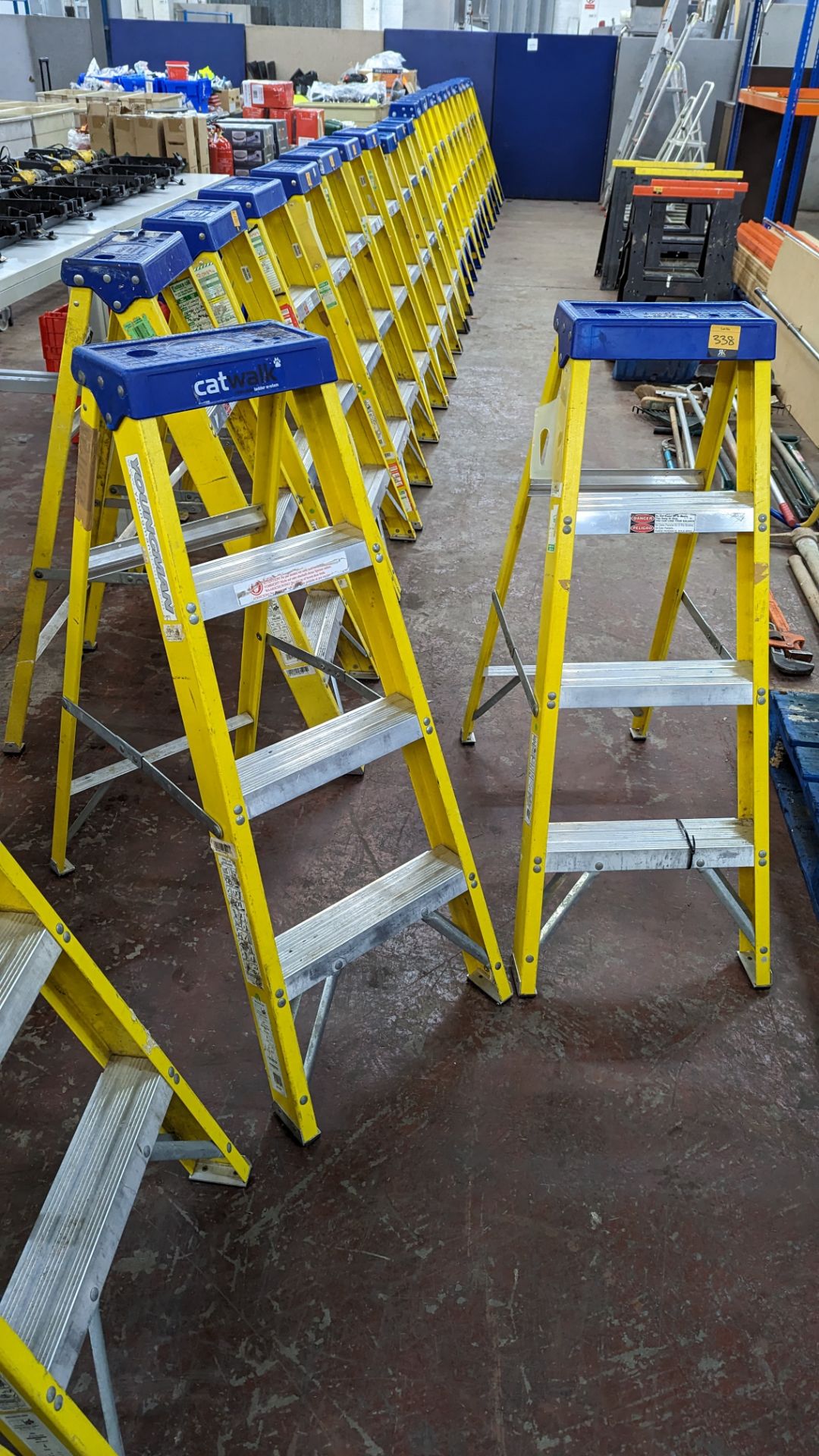 2 off Youngman 4 thread insulated stepladders. N.B. the stepladders forming lots 329 to 335 all app