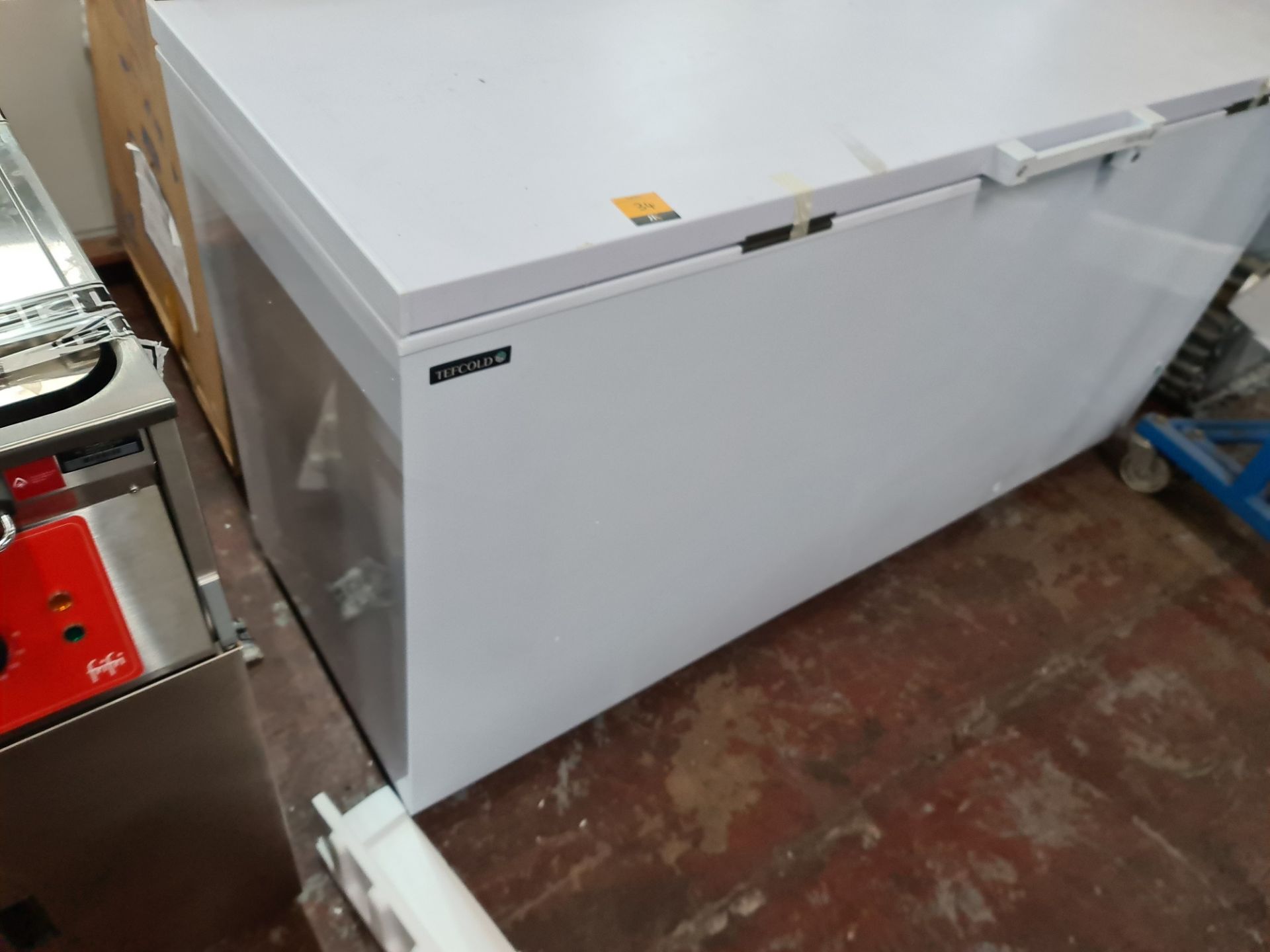 Tefcold 1.8 metre solid top chest freezer, model FR605SL, with 2 keys, appears new/unused.