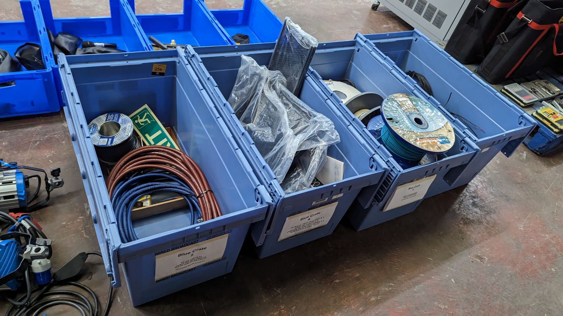 Contents of 4 crates of assorted cable and other items. N.B. crates excluded