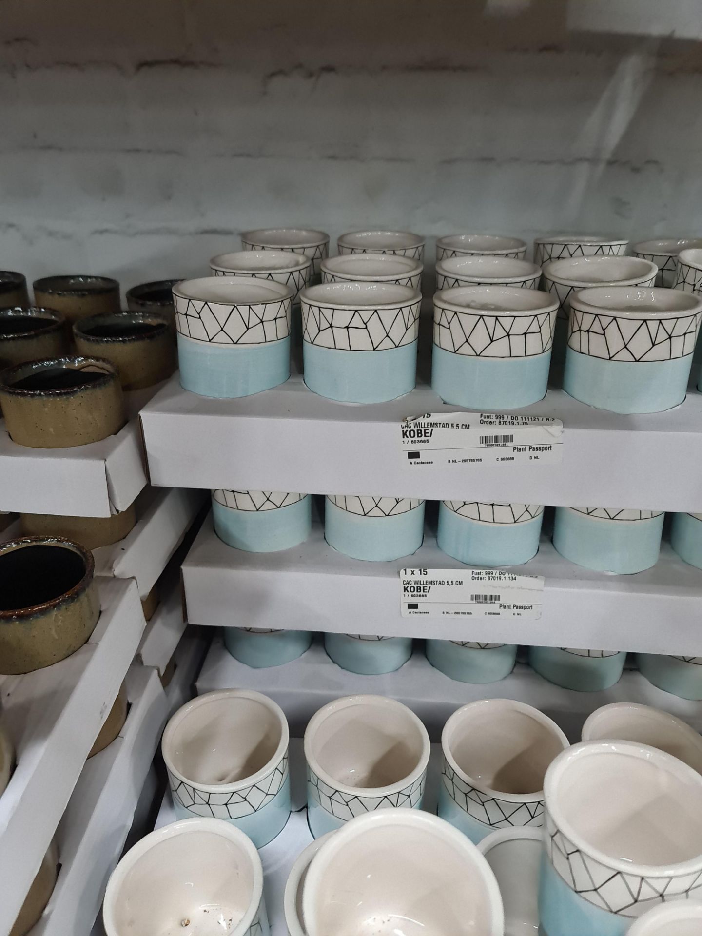 4 trays of Kobe 5.5cm blue patterned pots each standing on 3 legs, approximately 63 pots in total - Image 6 of 6