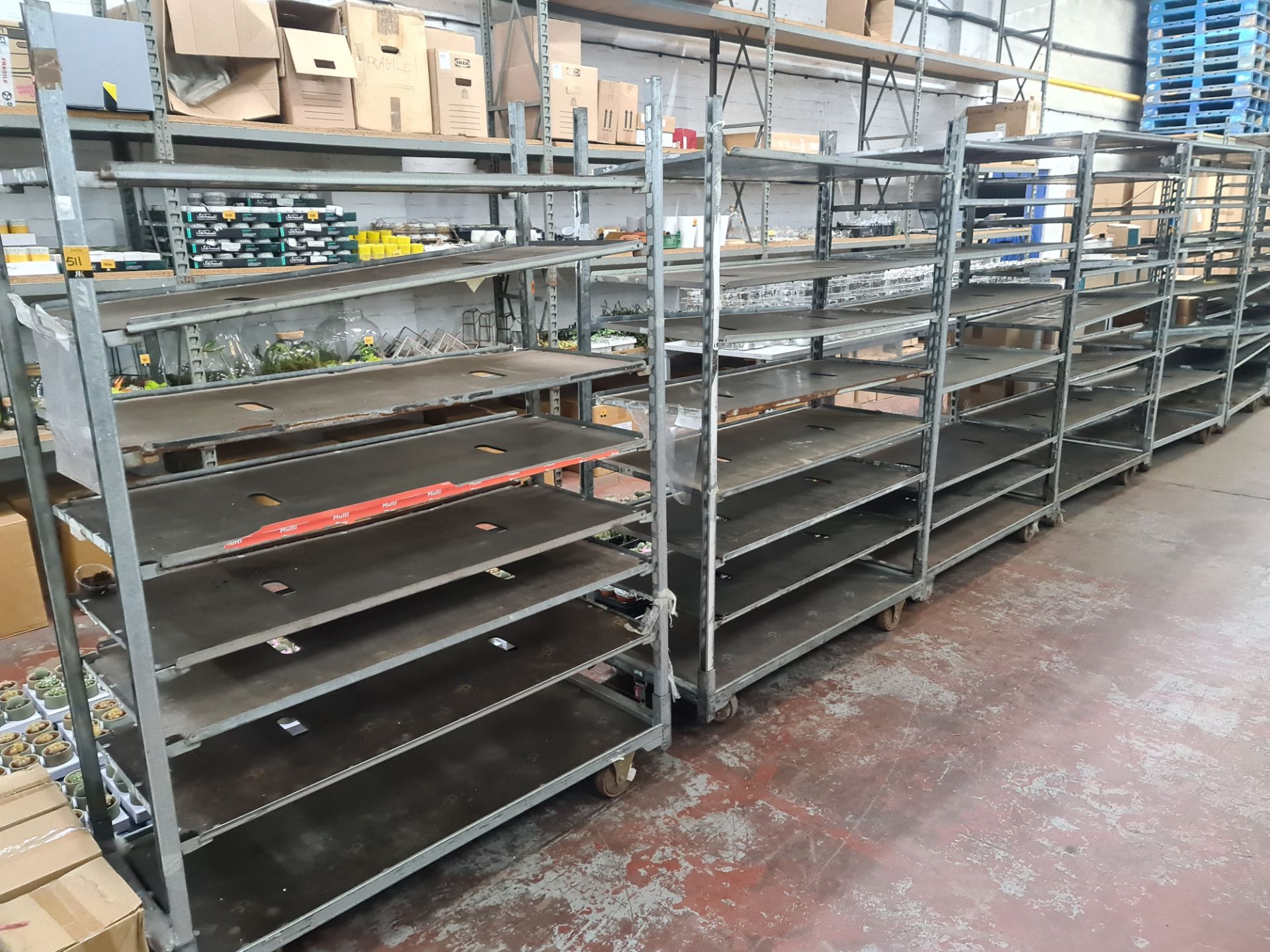 4 off large rectangular trollies with adjustable shelves for storing small plants