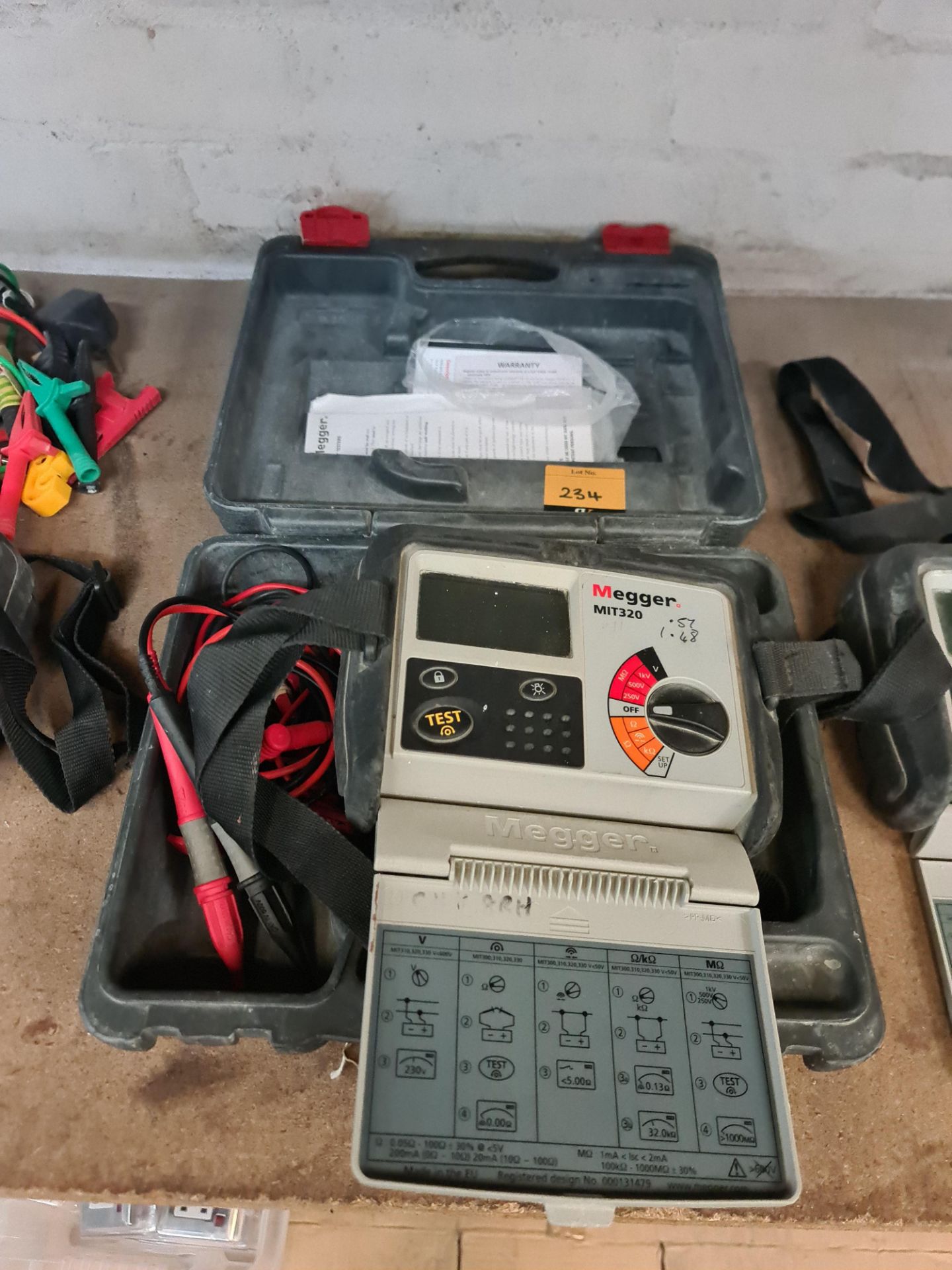 Megger insulation tester, model MIT320. This lot includes case and ancillaries